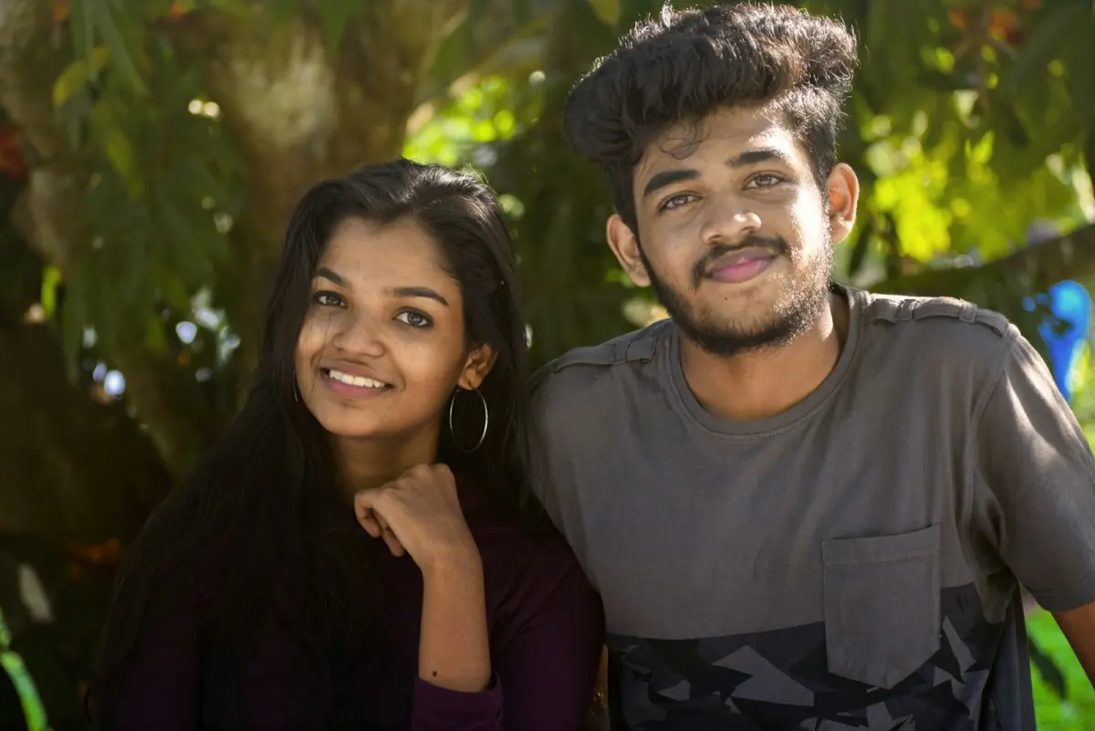 A couple's selfie, smiling